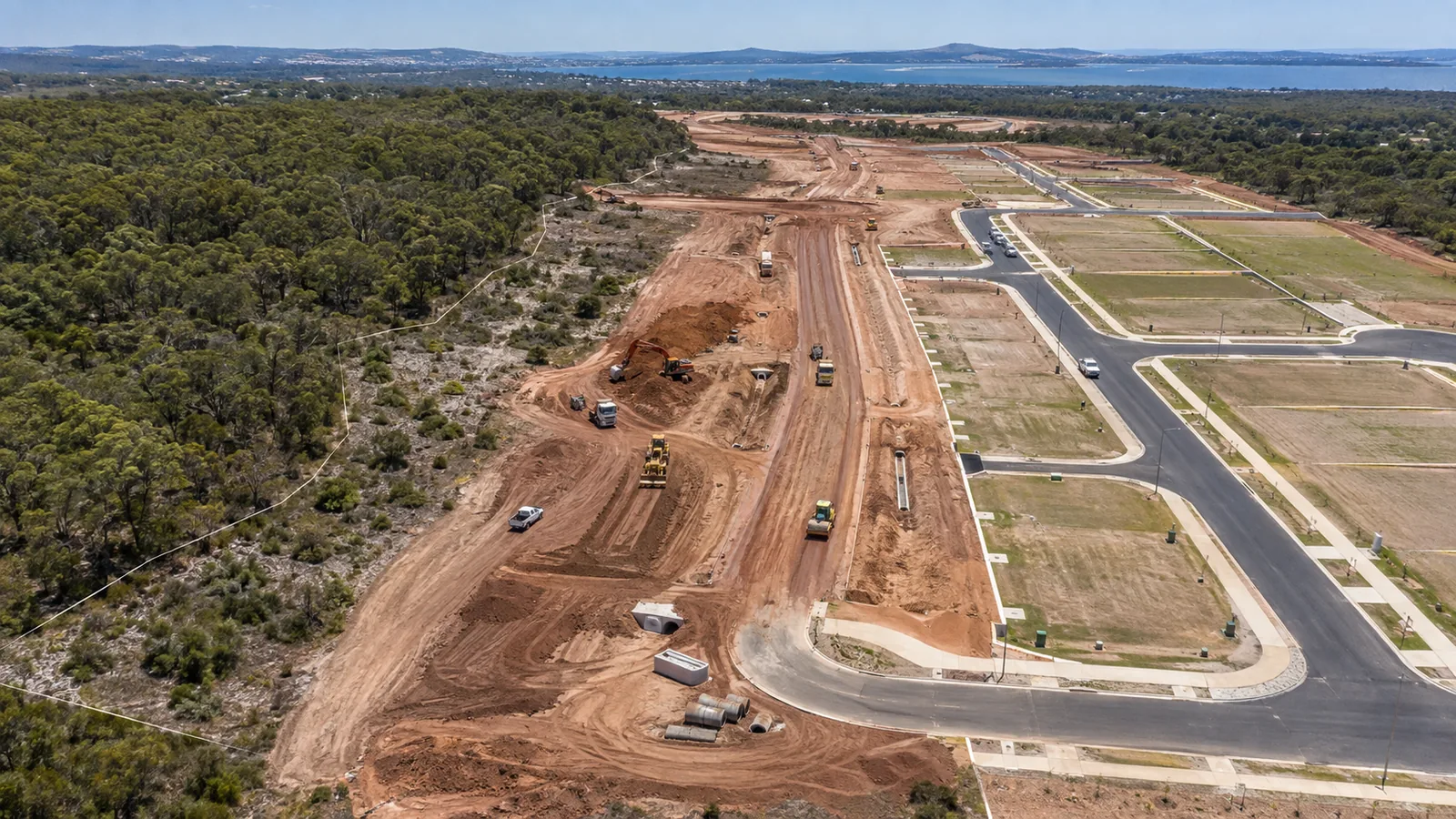 Illustrative Western Australian land development progressing from raw land through civil works to serviced lots